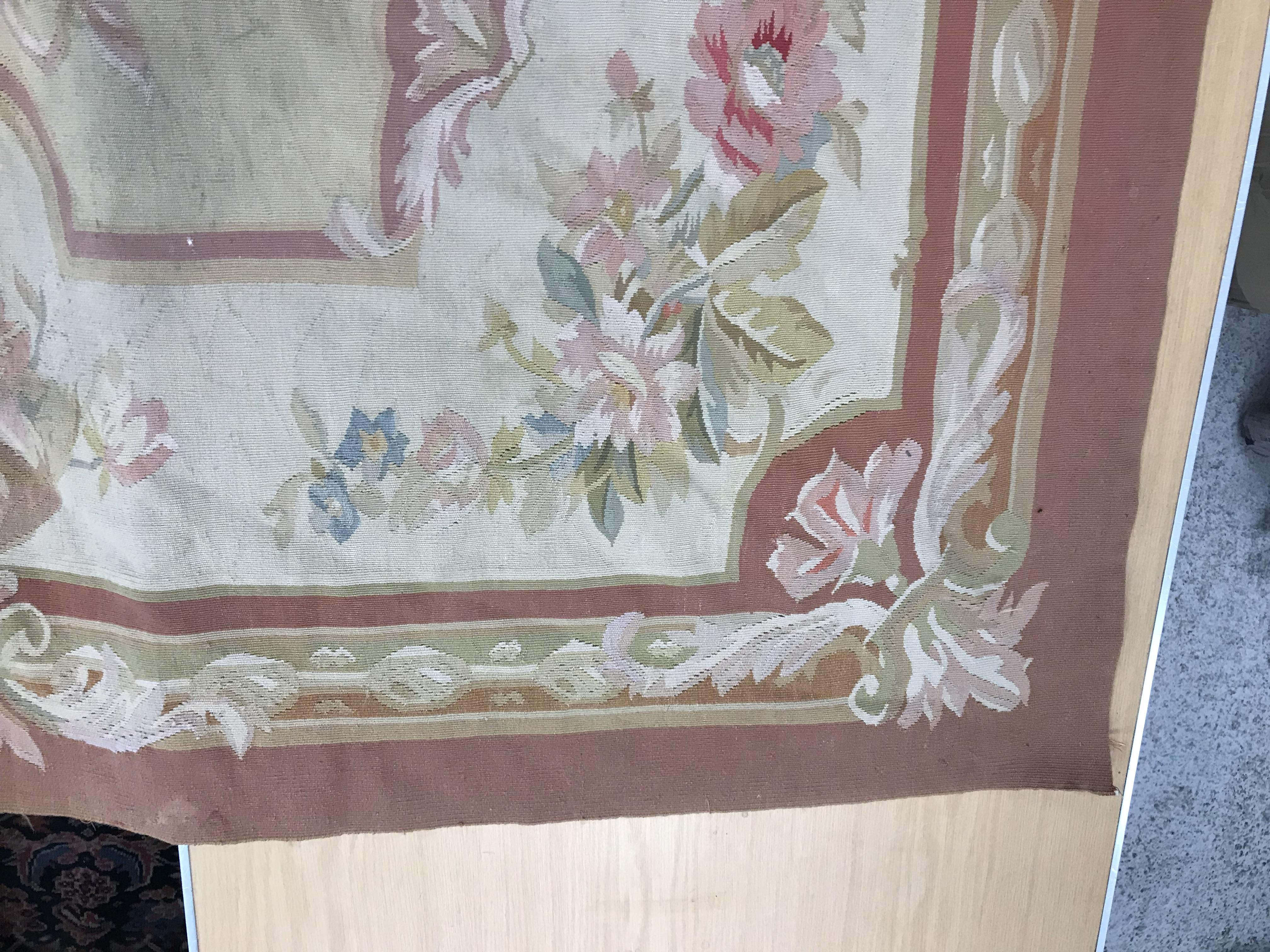 An Aubusson rug in terracotta and cream within foliate design, - Image 31 of 35