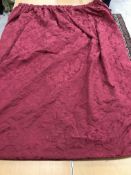 One pair of damask type burgundy ground foliate decorated interlined curtains with taped pencil