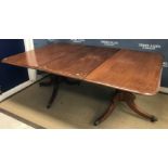 A late Regency mahogany dining table,