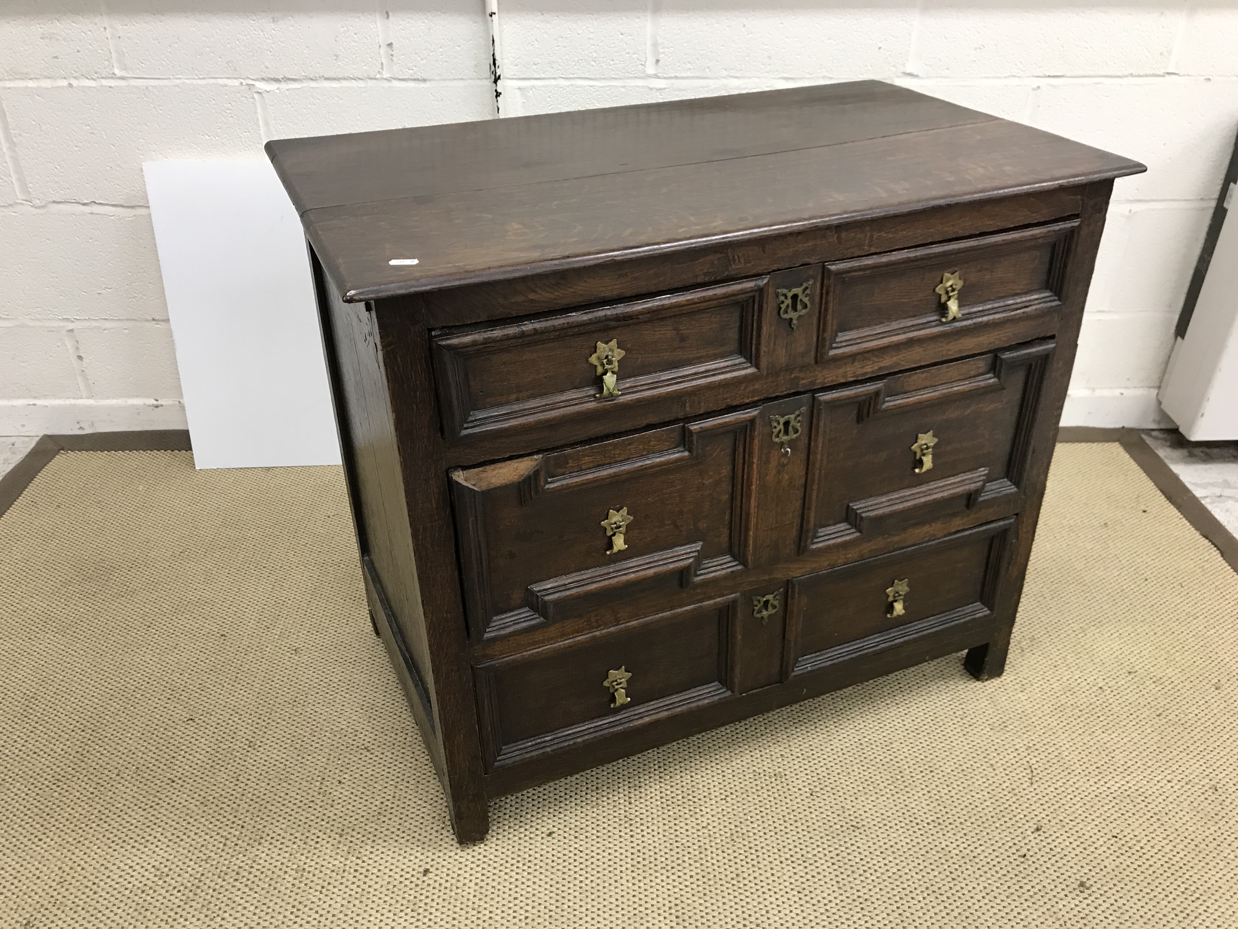 An oak chest in the 17th Century manner,