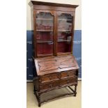 A 1920s oak bureau bookcase in the 17th Century style,