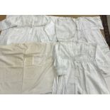 A box containing cotton nightdresses, christening gowns,