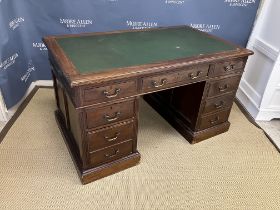 A Victorian mahogany double pedestal office desk bearing ivorine label "Geo. D.