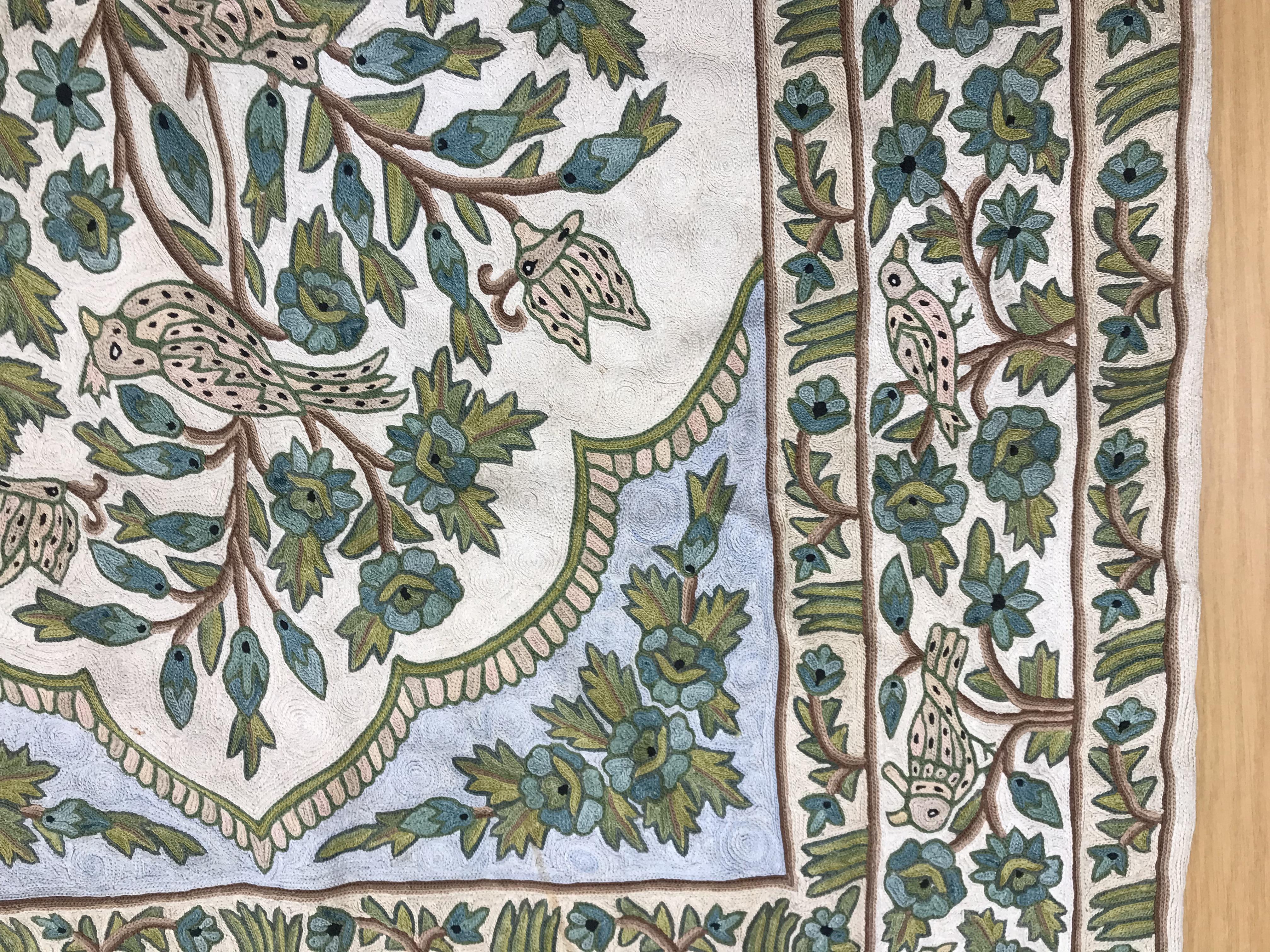 A crewel work panel depicting tree and birds in blue and teal on a cream and blue ground, - Image 11 of 16