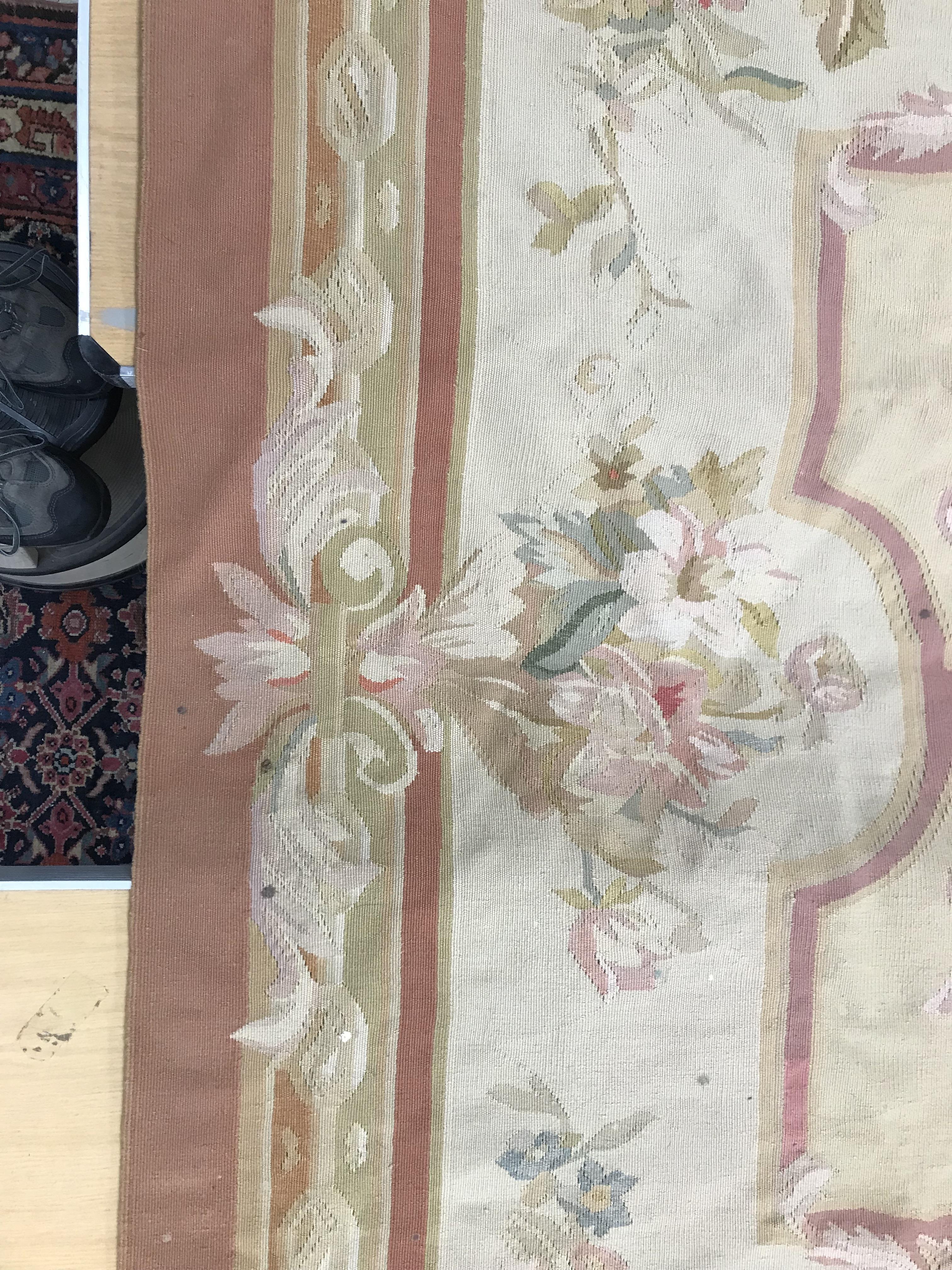 An Aubusson rug in terracotta and cream within foliate design, - Image 11 of 35