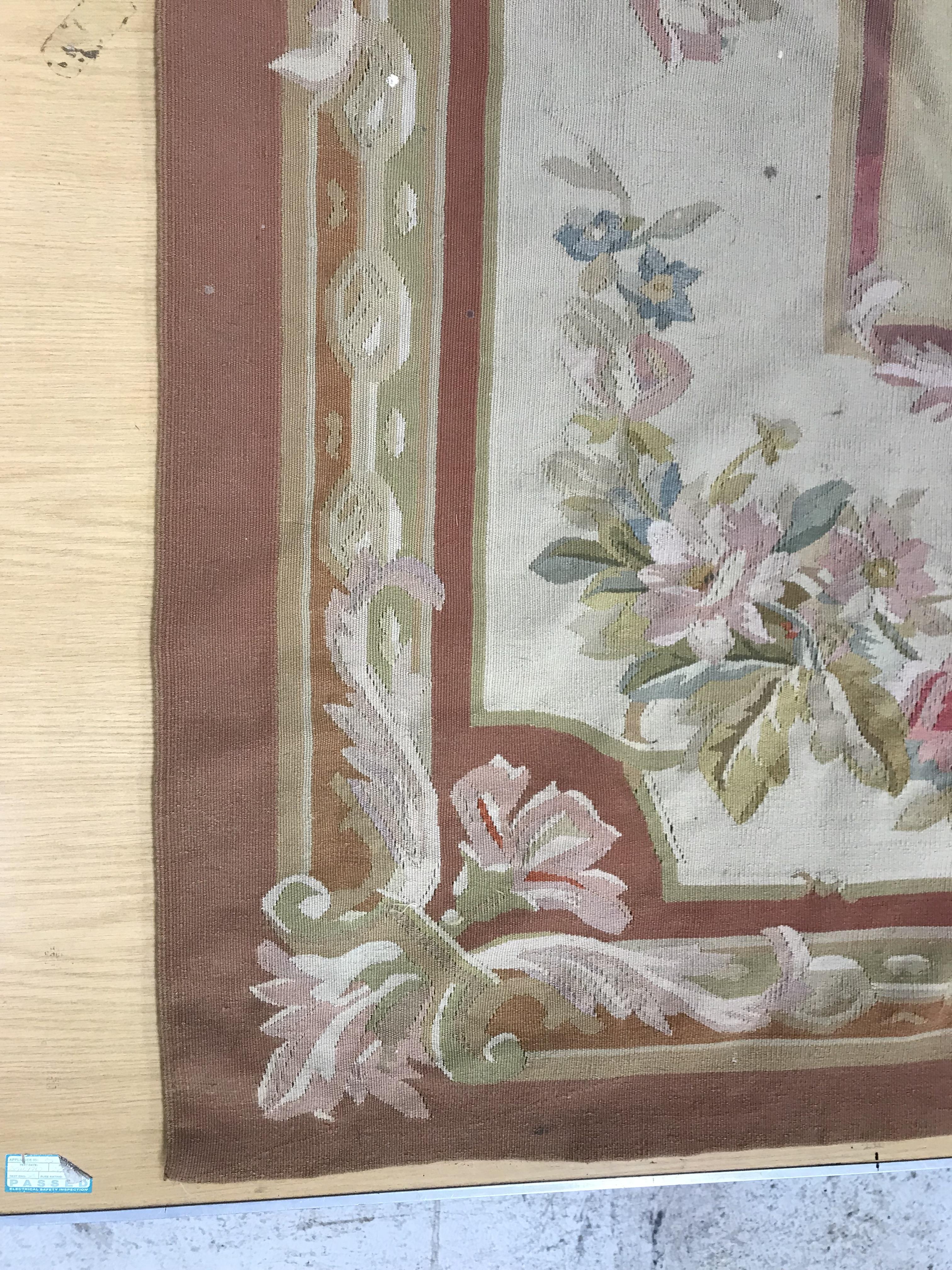 An Aubusson rug in terracotta and cream within foliate design, - Image 12 of 35