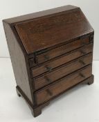 A 19th Century mahogany miniature bureau,