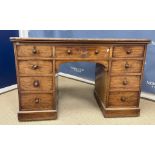 A Victorian mahogany kneehole desk,