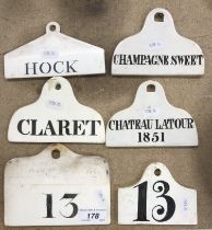 Six various 19th Century white glazed pottery wine bin tags including a Wedgwood example impressed