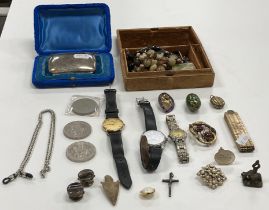 A box containing a collection of various objets de vertus including yellow metal mounted seed pearl