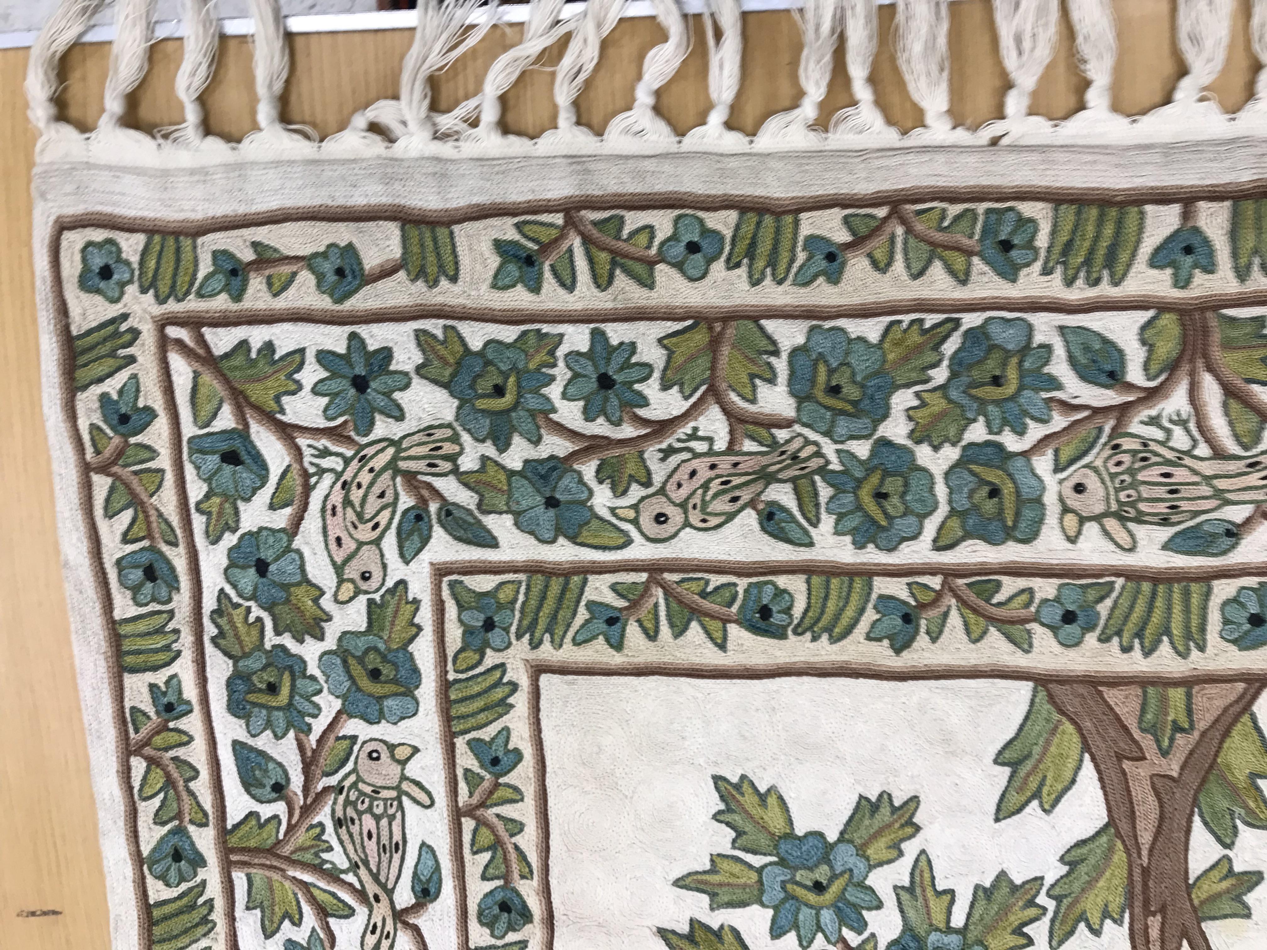 A crewel work panel depicting tree and birds in blue and teal on a cream and blue ground, - Image 3 of 16