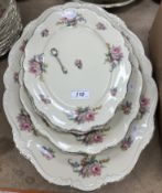 A Rosenthal Pompadour cream ground floral spray decorated and gilt lined dinner service comprising