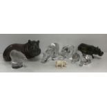 A collection of decorative hippos to include two Baccarat glass models, an Orrefors model,
