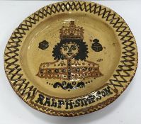 A slipware charger in the 17th Century manner,