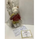 A Steiff by Danbury Mint Rupert Bear soft toy in yellow check trousers and matching scarf with red