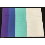An Althea McNish design fabric sample in purple, blue and aqua through aqua,