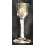 An 18th Century wine glass, the bucket shape bowl on a double enamel twist stem to circular foot 13.