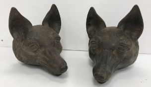 Two heavy cast iron fox mask door stops, 13.