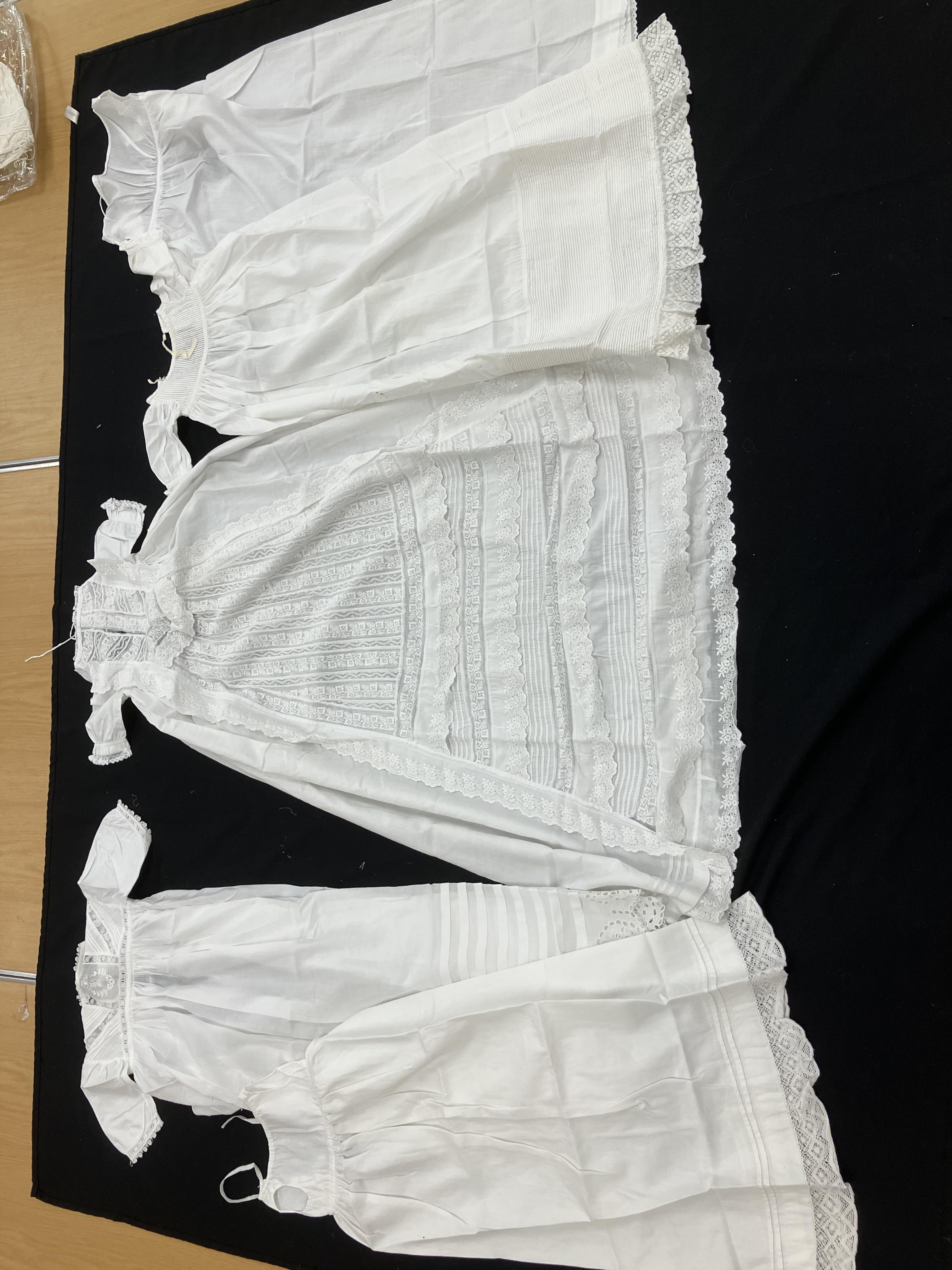 Nine various 19th Century Christening and other baby gowns, together with various lace sections,