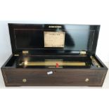 A Nicole Frères eight air music box housed in a rosewood and inlaid case,