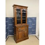 A late Victorian walnut secretaire bookcase cabinet,