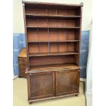 A 19th Century mahogany bookcase cabinet, the three quarter galleried top over five shelves,