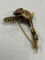 A 9 carat gold fieldmouse and wheat ear brooch 4.5 cm long, 7.