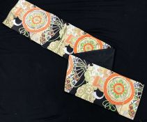 A late 20th Century Japanese obi belt with orange, green, white and gold fan and floral decoration,