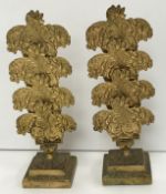 A pair of 19th Century French pressed brass floral and foliate decorated three section desk top