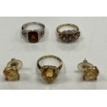 A 9 carat gold dress ring size L set with five graduated Madeira citrines within a diamond border 4