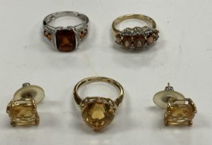 A 9 carat gold dress ring size L set with five graduated Madeira citrines within a diamond border 4