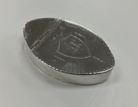 A Georgian silver snuff box of navette form with Scottish type blind hinge and engraved decoration