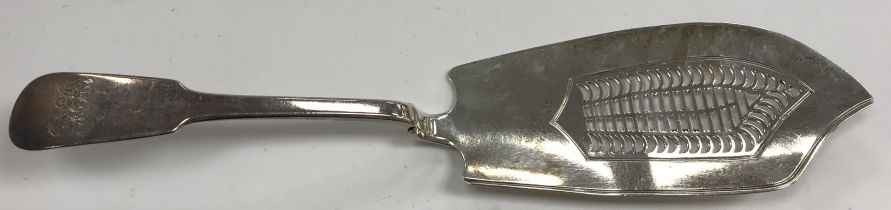 A George III pierced silver "Fiddle" pattern fish server (by Thomas Freeth, London 1818),
