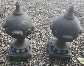 A pair of composite stone Victorian style orb gate finials/post finials with leaf and bead