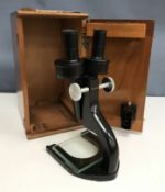 A Charles Perry DMIS No. 3 microscope, No'd.