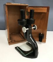 A Charles Perry DMIS No. 3 microscope, No'd.