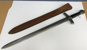 A modern replica Viking sword with ebony handle with steel pommel and hilt and blade,
