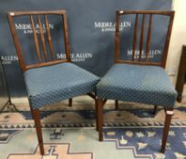 A pair of "Burford" Gordon Russell dining chairs with blue upholstered seats (2)