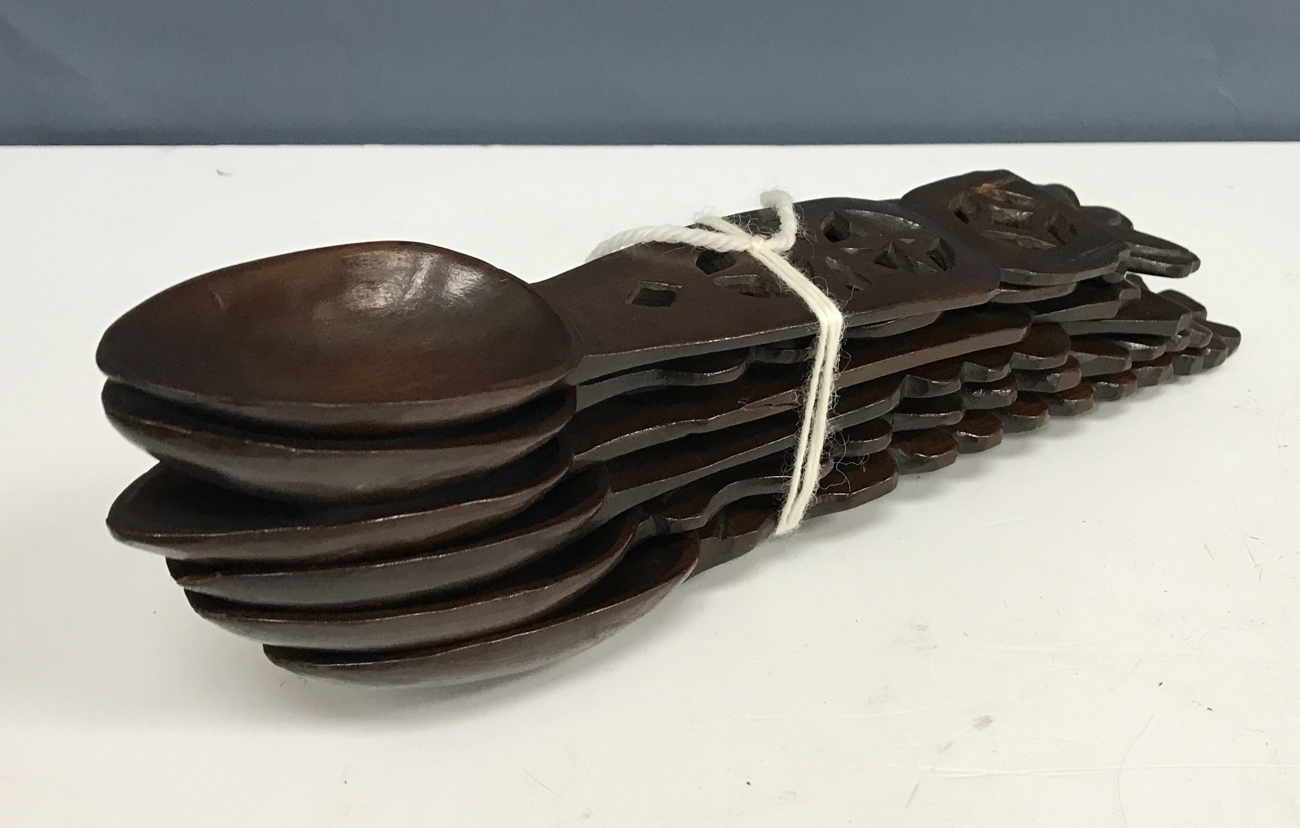 A collection of six Welsh carved treen ware loving spoons,