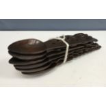 A collection of six Welsh carved treen ware loving spoons,