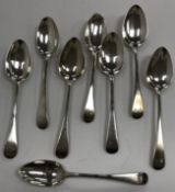 A composite set of eight 19th Century "Hanoverian/Rat tail" pattern dessert spoons,