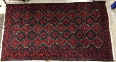 Three rugs : A Bokhara rug,