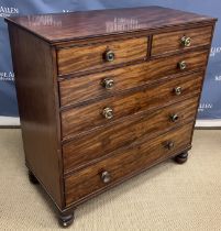 A 19th Century mahogany chest of two short over four long graduated drawers with pressed brass