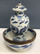 A Chinese blue and white baluster shaped vase and cover,