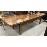An oak dining table in the 19th Century French taste,