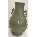 A Chinese celadon glazed vase bearing faux six character Chenghua (1465-87) mark to base,