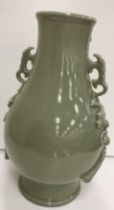 A Chinese celadon glazed vase bearing faux six character Chenghua (1465-87) mark to base,