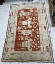 A vintage Khotan carpet,