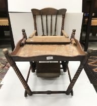 A circa 1900 stained beech and transfer decorated metomorphic child's highchair,