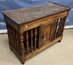 A 19th Century French walnut food or bread cupboard in the 17th Century manner the top with moulded